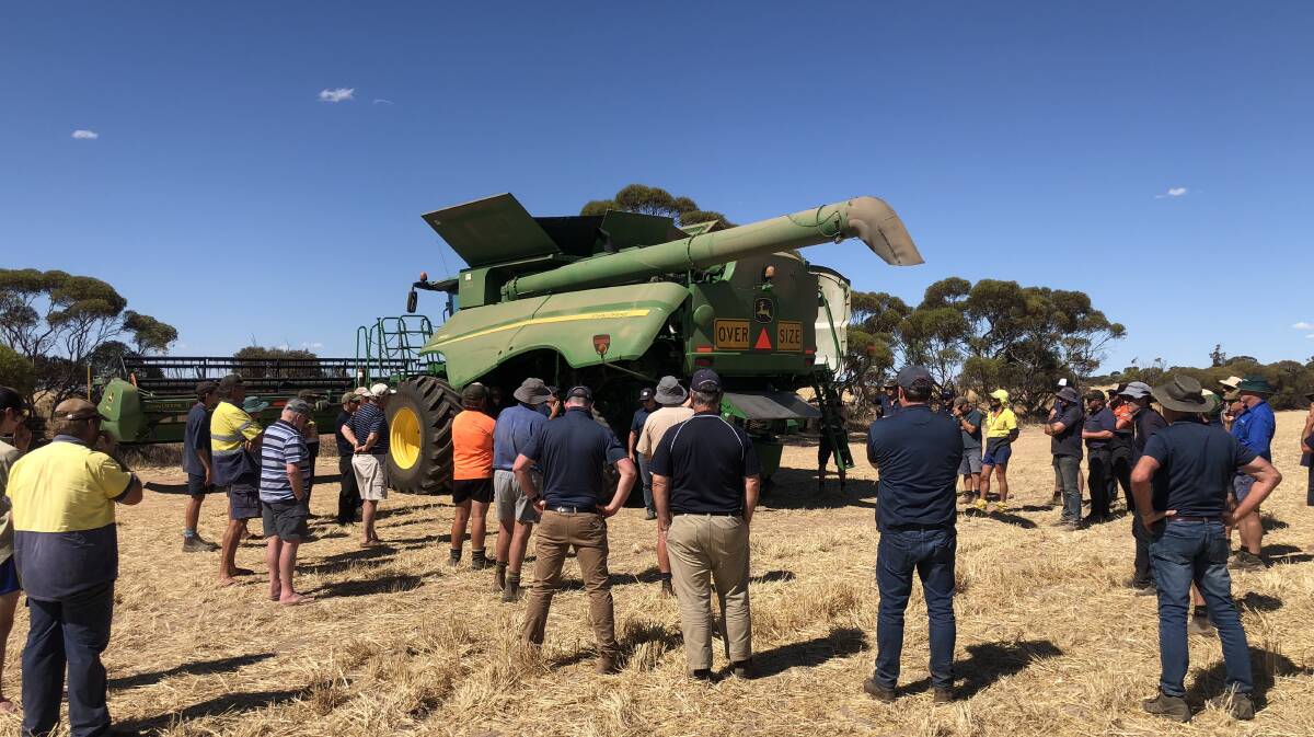 WEED DESTRUCTION: Growers viewing a demonstration of the new vertical, mechanical Integrated Harrington Seed Destructor (IHSD) on a property near Carnamah in the northern grain region of WA last month.