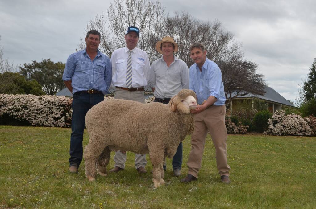 Damian Meaburn, Paul Dooley, Ben Patrick and Steve Phillips, Yarrawonga, with the ram bought by Roy Freeman, Stonehouse Grazing, Lemont, Tas for $20,000.