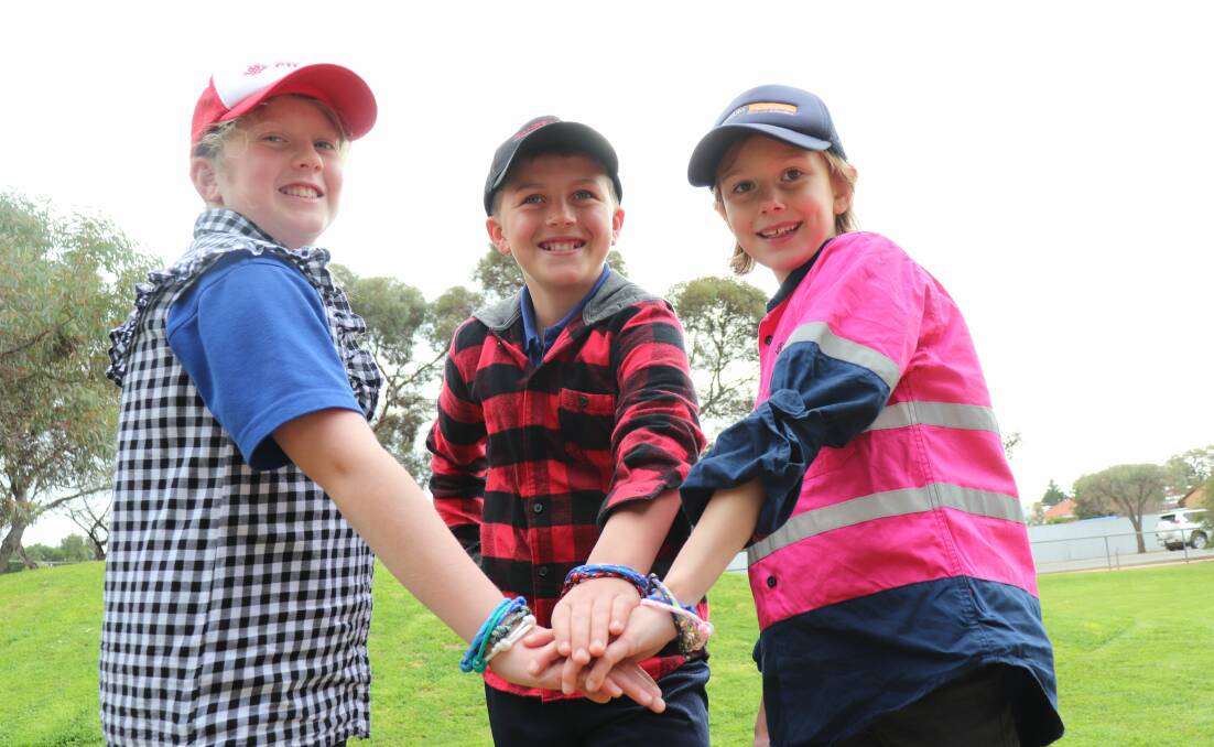 DROUGHT FUNDRAISER: Owen Primary School students Charlotte Branson, Corbin Branson and Charlotte Hodgetts with their Rope 4 Hope bracelets they have made to raise money for struggling SA farmers.