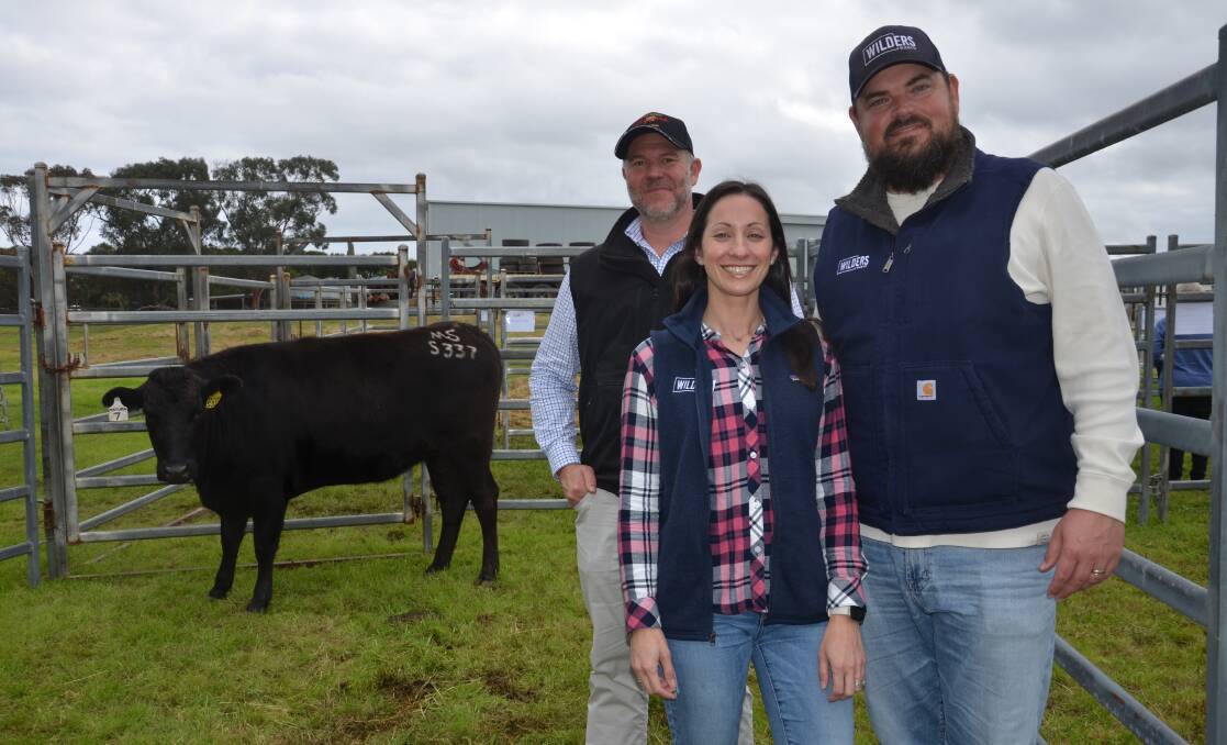 Mayura's Scott de Bruin and United States buyers Jaclyn and Reid Smith, Wilders Wagyu, Clayton, North Carolina with the highest priced unjoined female- lot 7, Mayura S0337. They paid $60,000 for the female and also bought another heifer for $32,000.