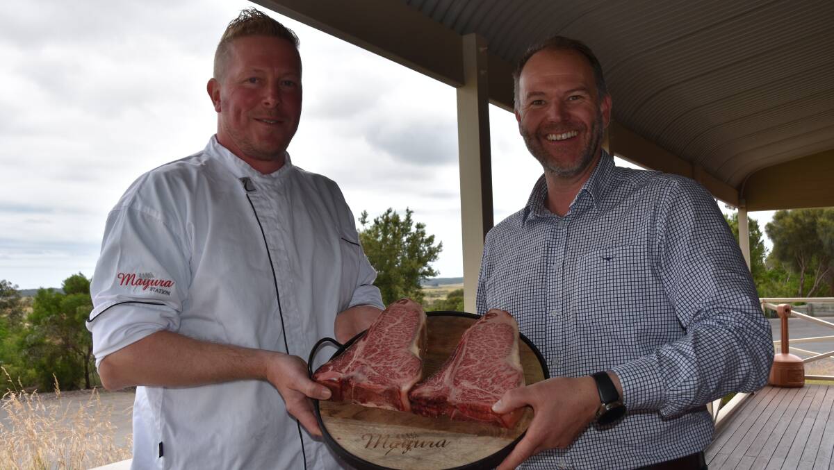 DINING EXPERIENCE: Mayura head chef and The Tasting Room manager Mark Wright and managing director Scott de Bruin with a couple of their Wagyu T-bone steaks.