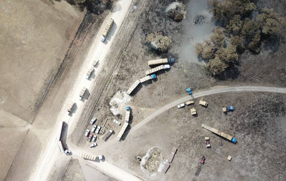 Aerial photo of some of the trucks rolling with hay donations. Photo: Isabelle Smith