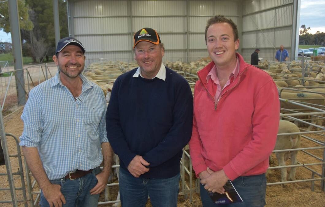 BIG BIDDER: Paxton stud principal Martin Harvey with volume buyer Nigel Watson, Lucindale and agent, Elders Lucindale branch manager Ronnie Dix who bought 35 White Suffolk rams for a $1560 average.