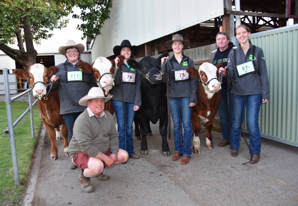 LEARNING EXPERIENCE: Grant High School students Ryan Bald, Shaylah Cole, Felicity Kelly and Monique Allen with ag teacher Scott Cram and (kneeling) Grantley Muller who organised the students to attend and supplied many of the animals for them.
