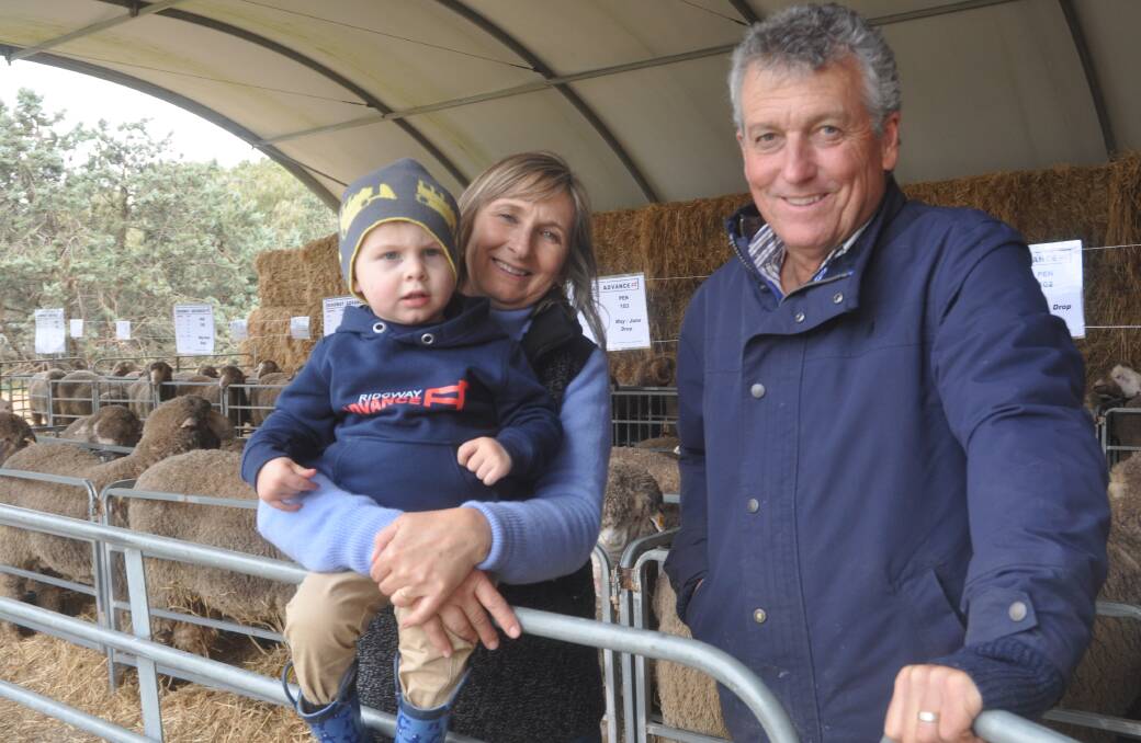Karen Ridgway and one-year-old grandson Hudson Ridgway, with Bill Walker, Classings Limited, Murray Bridge, who bought 13 rams for five clients.