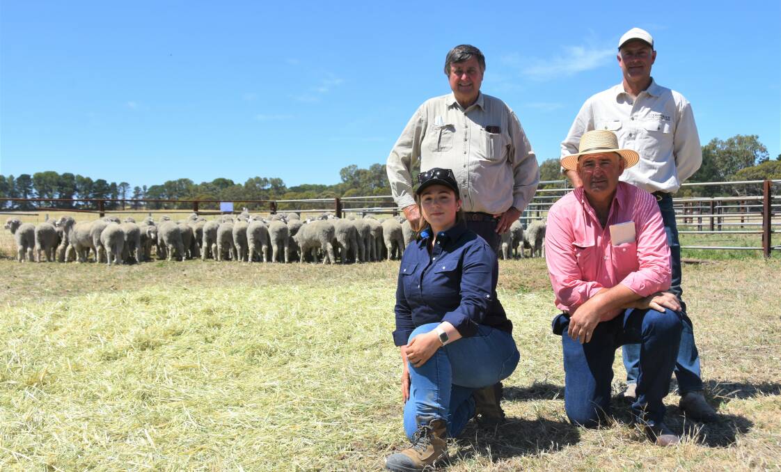 CHANGING OF GUARD: Canowie stud principal Ken Sawers and manager Monica Ley (kneeling left) with new owner David 'Seth' Cooper and Elders livestock sales manager - southern Laryn Gogel.