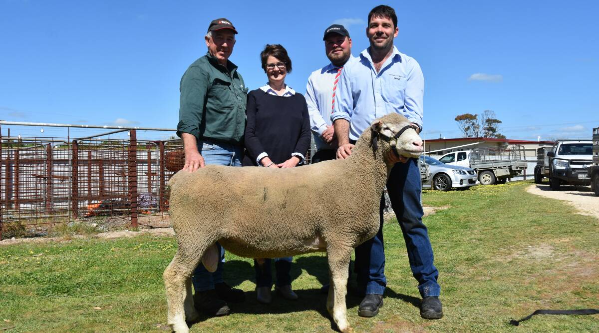 MUSCLE MACHINE: Buyers of the $3800 top price ram,Tim and Debra Downing, Morooroo,Mundulla, Southern Australian Livestock's Mat MacDonald and Brad Davies, Wrattenbullie stud.