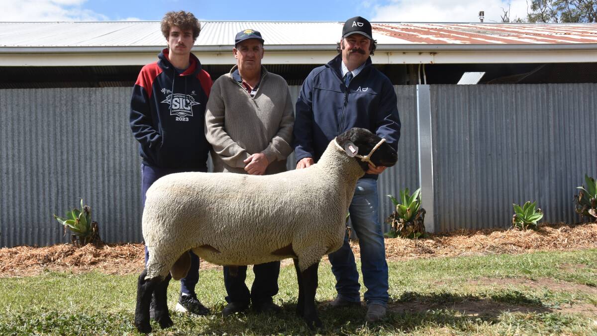 Jaxon and Tom Millard, She-Oak Lodge, Mount Hope, with the lot 1 ram being held by Alastair Day which they bought for $13,000.