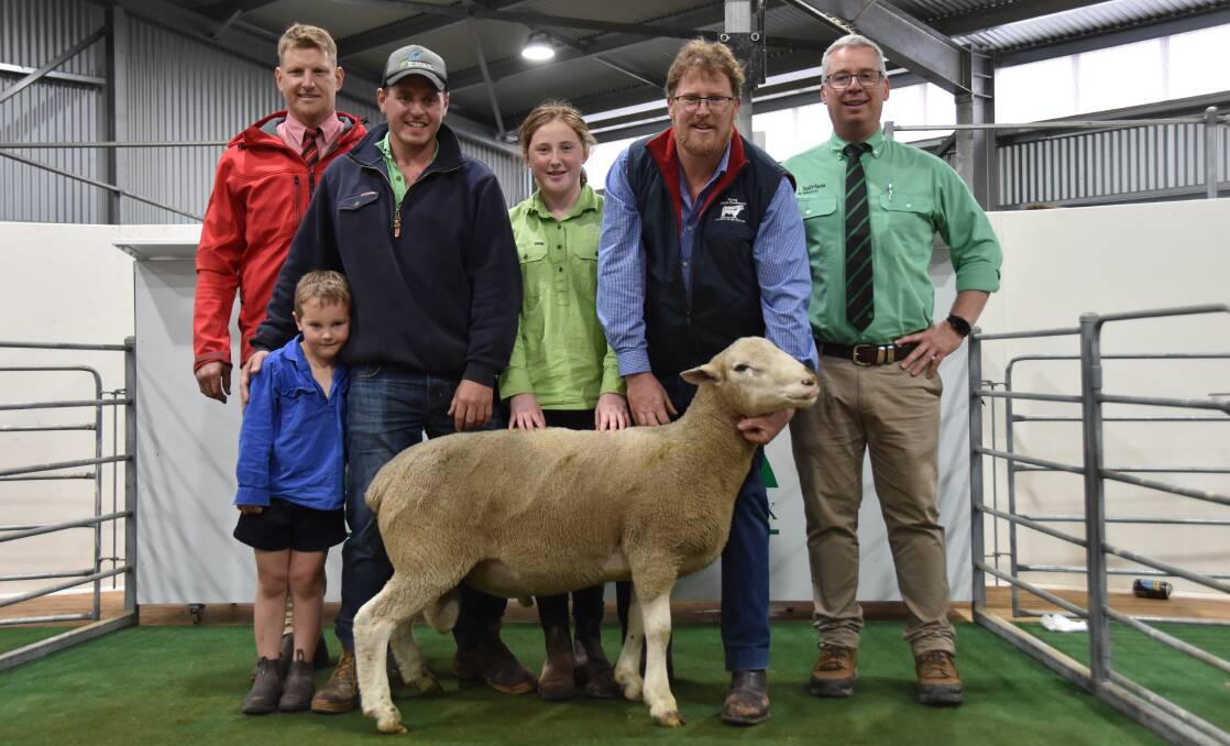 Elders Scott Christie, buyer Sam Clothier and son Jack, Woolumbool stud's Jacqueline and Aaron Clothier and Nutrien's Gordon Wood with the $3200 top price ram.