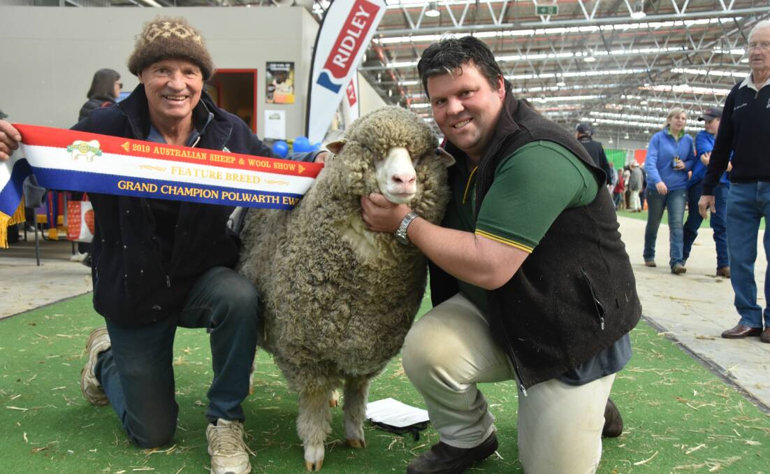 TWO IN ROW: David and Jared McArdle, Taljar stud, Parndana, with their champion ewe.