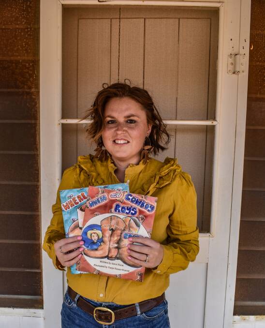 STORY SHARED: Author Anna Nunn, Wooltana Station via Copley with the two children's books she has written about Cowboy Roy's adventures.