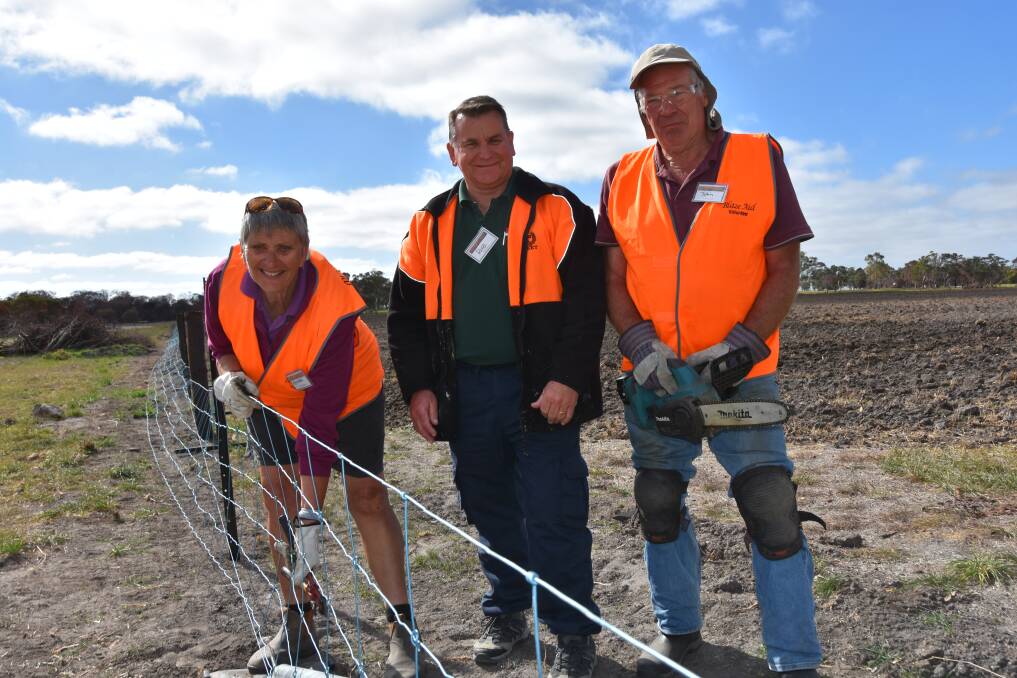 PASSION PROJECT: BlazeAid volunteers Lyndal Moulton, Edenhope, Vic; John Savage, Koroit, Vic, and trainee camp coordinator Rob Edwards (middle), Virginia, rebuild a fence on Ashley and Sharon Reynolds' property.