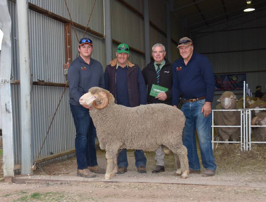 SIRE APPEAL: Radnor stud's Ben and Steve Koehler (right) with the $4000 top price ram, buyer Dean Wheaton, Kaniva, Vic, and Landmark auctioneer Leo Redden.