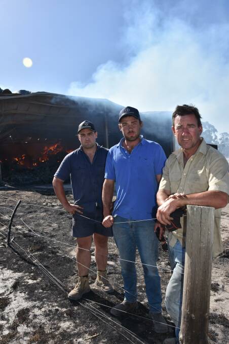 James, Grant and Keith Higgins, Patanga Pastoral Co, Avenue Range, in front of a hay shed that was still burning when Stock Journal visited in January 2021.