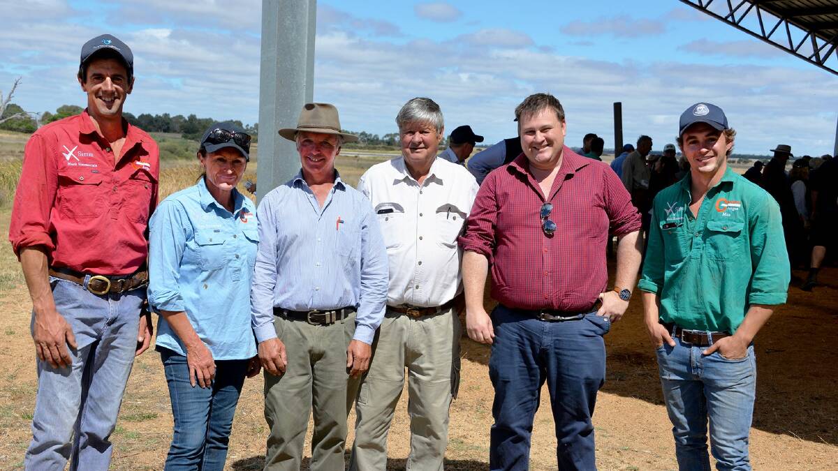 BIG BIDS: Martin Beltrame, Anna, Mark and Max Gubbins (right)n with volume buyers  Legh and Scott Winser, Benara Pastoral, Mount Gambier, who secured 26 bulls for a $7923 average.