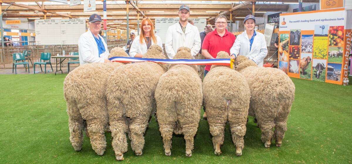 Kevin Crook, Claire McGauchie, Angus and Richard Halliday and Danni Wilson with Tamaleuca stud's winning Lehmann trophy for the best group of five August-shorn sheep. With no Merino group, the Tamaleuca team from Ouyen, Vic, were elevated to supreme group. Picture by Jacqui Bateman