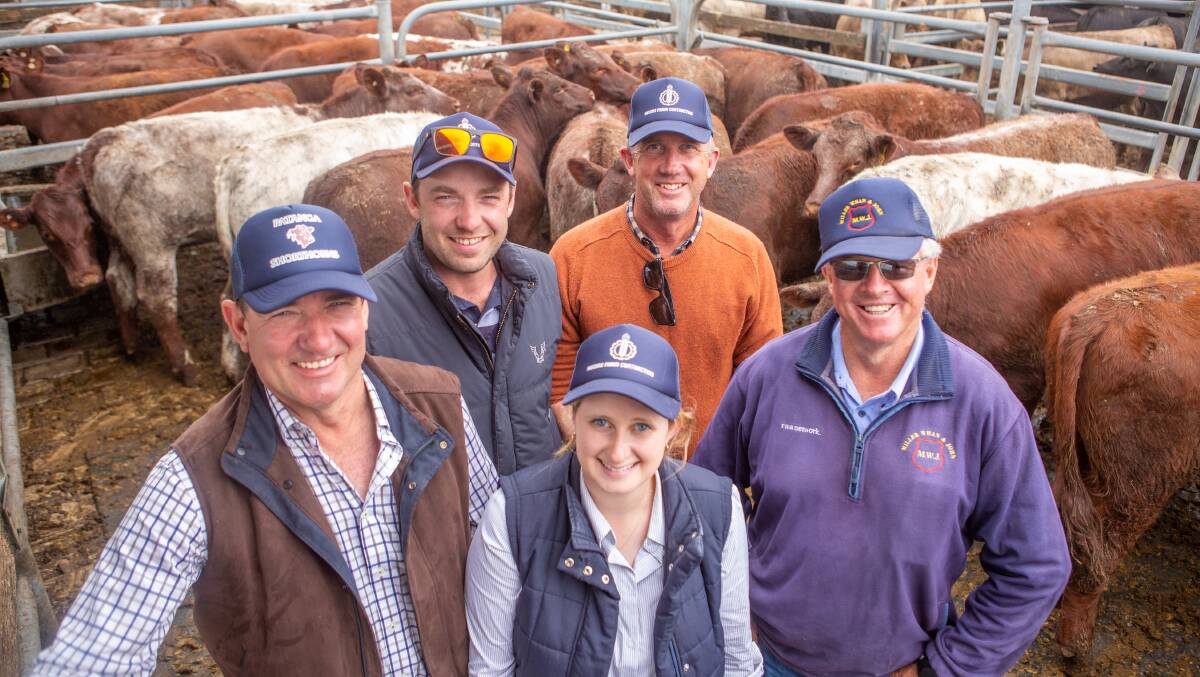 MILESTONE MOMENT: Patanga Pastoral's Keith and Grant Higgins and Evie deJager, Avenue Range, and Brett Haythorpe, Mount Barker and their long-time agent Mike Newton, who has just retired, at the Mount Gambier store cattle sale earlier this month.