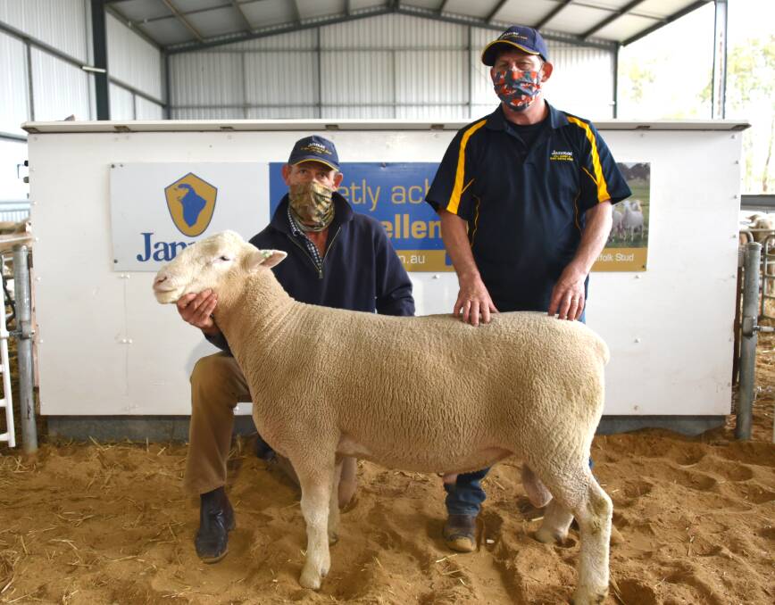 Grant and Bryce Hausler, Janmac stud, Goroke, with their lot 20 ram which set a new stud record of $11,250 selling to Zacman stud, Binnum.