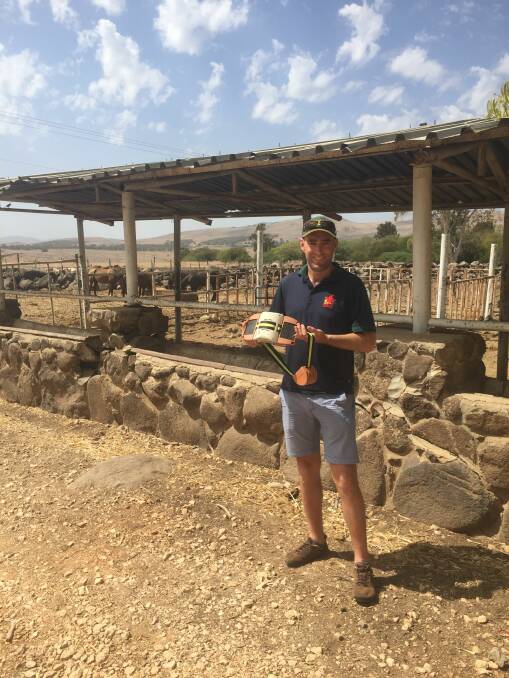 ISRAELI INNOVATION: Jack England, Shepherds Hill, Keilira, has completed a Nuffield scholarship sponsored by Australian Wool Innovation. He is pictured in Israel with the Moonitor, a GPS collar developed during the past decade.