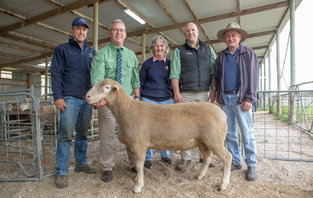 POLL POSITION: TDC's Rob Handbury, Landmark's Gordon Wood, holding the $2800 sale topper with vendor Mary Burzacott, Landmark Millicent's Anthony Driessen and buyer Hartley Hocking, Lucindale.