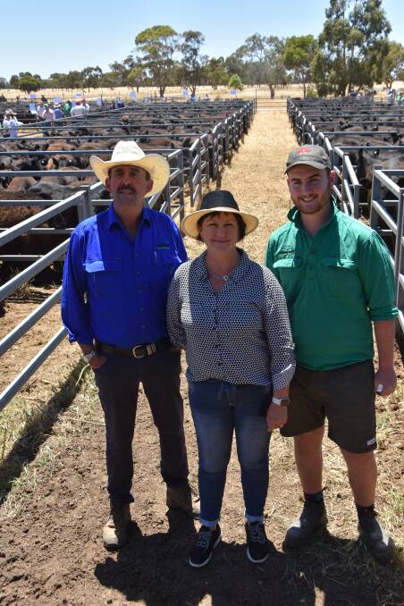 BIG BIDS: Amherst's Ian, Louise and Patrick Johnson at the circuit weaner sale, where their yearling steers sold to $2070.