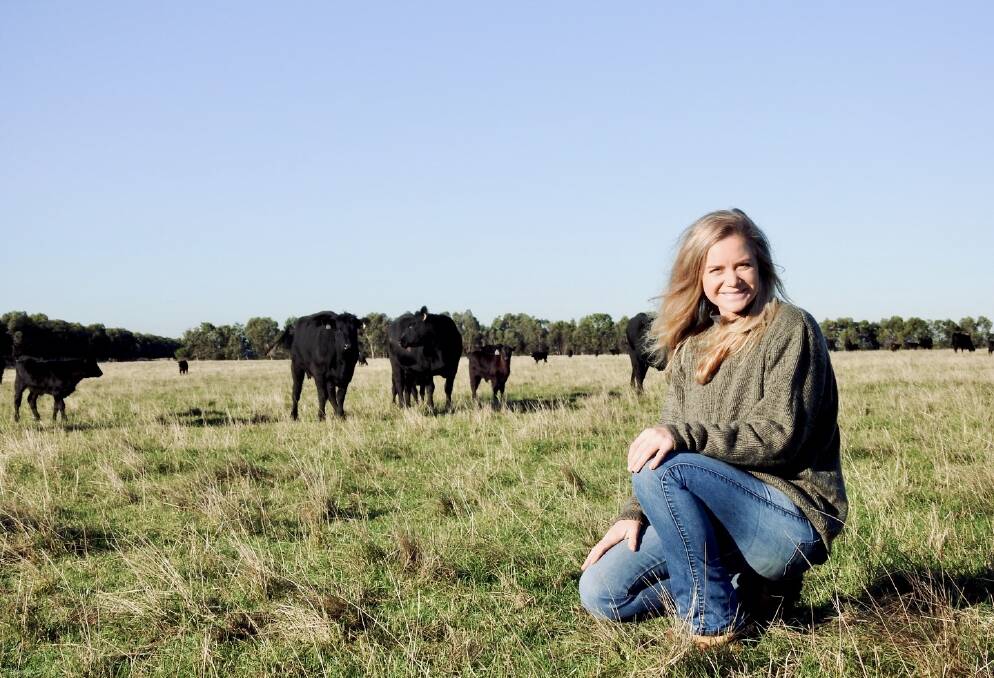 HANDS ON: Veterinarian Dr Elle Moyle with Angus cattle in Victoria.
