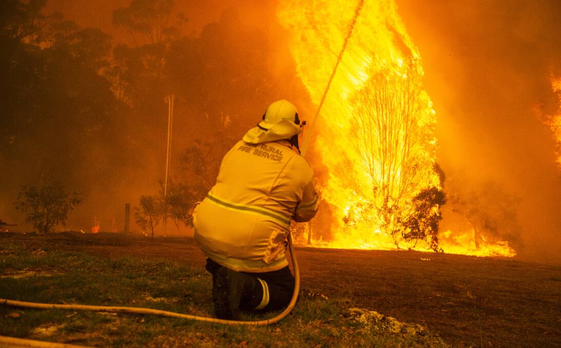 DEVASTATING: New research aims to greatly reduce the loss and trauma suffered by both humans and animals during bushfire events. Photo: DION GEORGOPOULOS.