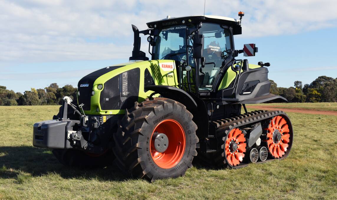 BEST OF BOTH: Wheeled operation with half-track traction, the new Class Axion 900 Terra Trac tractors boast a magic carpet ride experience.