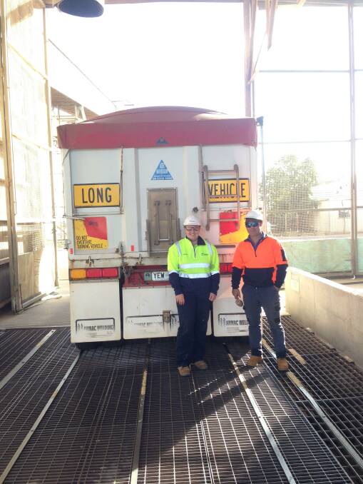 Viterra head classifier Jordan Sladdin with Mambray Creek grower Ben Bussenschutt with the first delivery of the season into Viterras Port Pirie site.