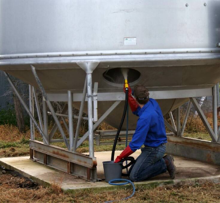 BUG BOMB: Applying diatomaceous earth to an empty silo helps to eradicate storage pests. Photo: CHRIS WARWICK