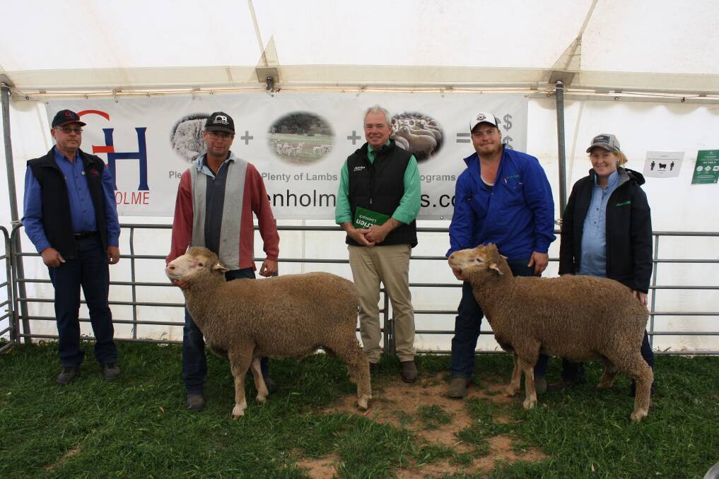 Glen Holme Dohne principal Allen Kelly with the two $3200 rams and Darren O'Brien, Kyancutta, Nutrien auctioneer Leo Redden, Daniel Hansen and Katie Rich, who acted on behalf of D&J Rich, Serviceton, Vic.