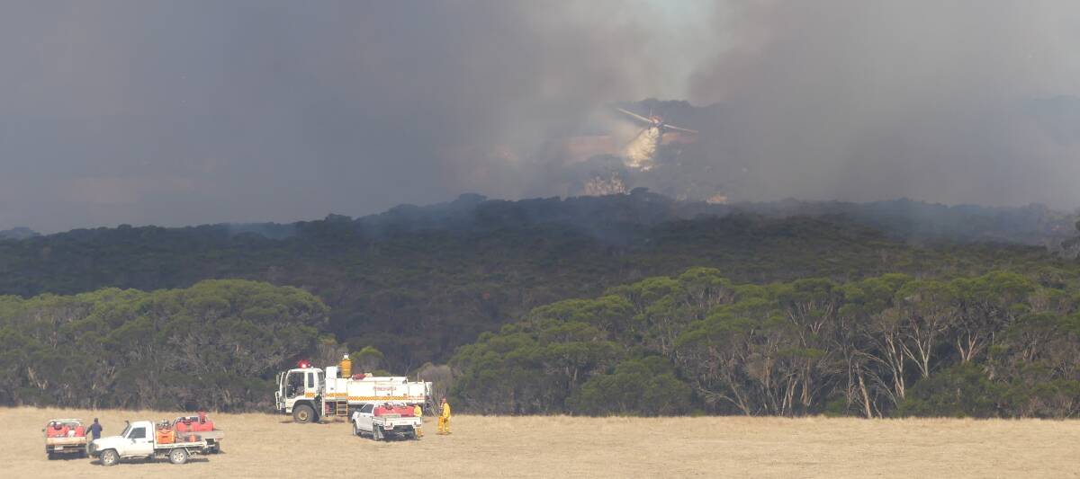 WATER RELIEF: An Aerotech air tanker dropping water on the Redbanks fire at Nepean Bay on December 6 - one of a handful of blazes on KI already this fire season.