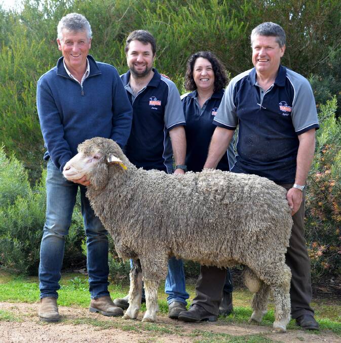 Pictured with the $4800 top priced Poll Merino ram at Ella Matta are Bill Walker, Classings Ltd, who purchased it for Alan Stewart, Stockton stud, Bairnsdale, Vic, and Jamie, Tracie and Andrew Heinrich, Ella Matta.