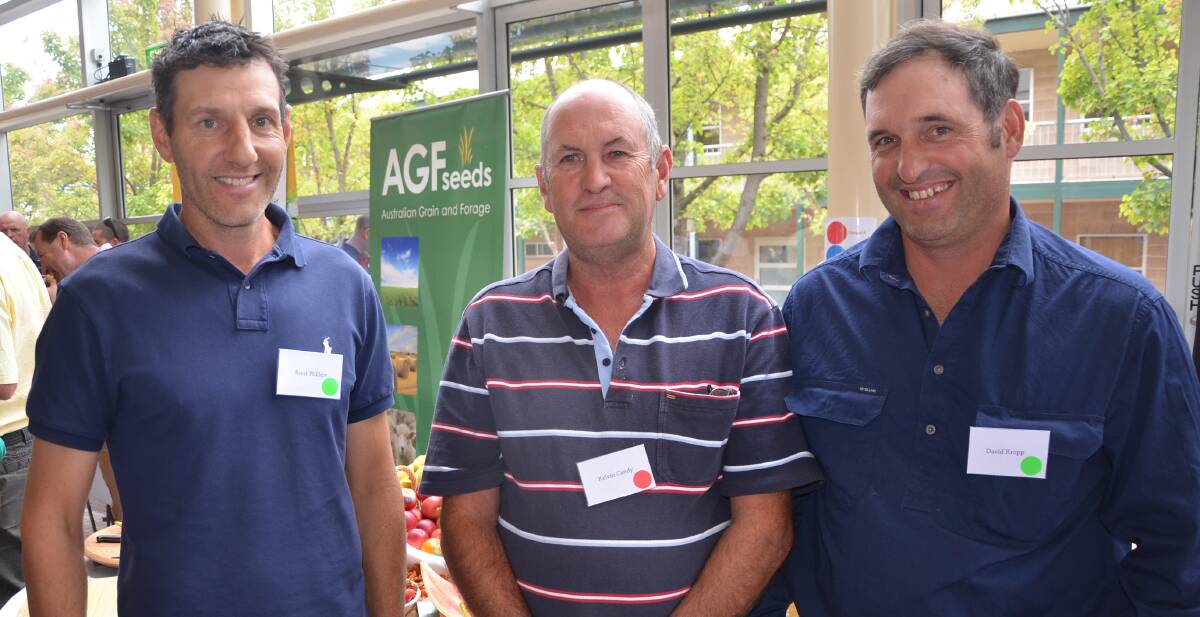 FARMING FRIENDS: Woodchester farmer Brett Phillips caught up with Langhorne Creek farmers Kelvin Candy and David Kropp at the SANTFA conference. 