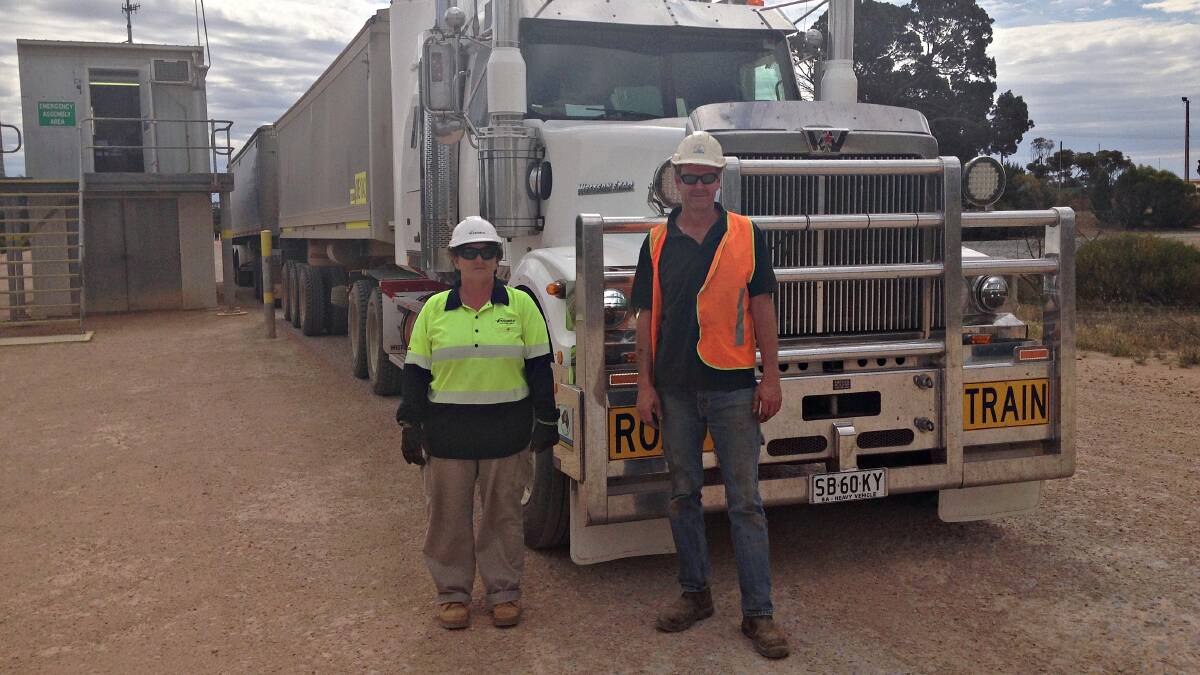 The pea delivery at Poochera, with Viterra employee Wendy Every and carrier Shane Trowbridge. The owner of the grain is Andrew Mahar.
