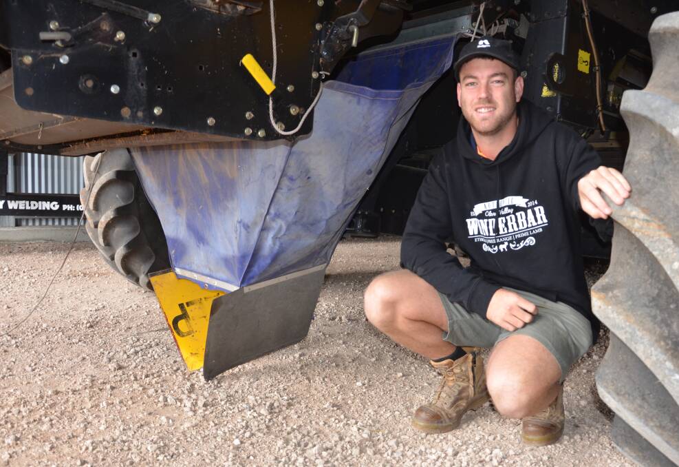WEED MANAGEMENT: Yorke Peninsula cropper Nathan Allen with their chaff lining header modification.
