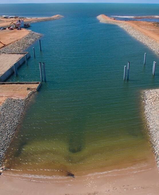 BIG HAUL: The Lucky Bay harbour has been excavated to a depth of 5.5 metres, allowing a transship to haul 3500 tonnes a load three times a day to cargo ships in the gulf.