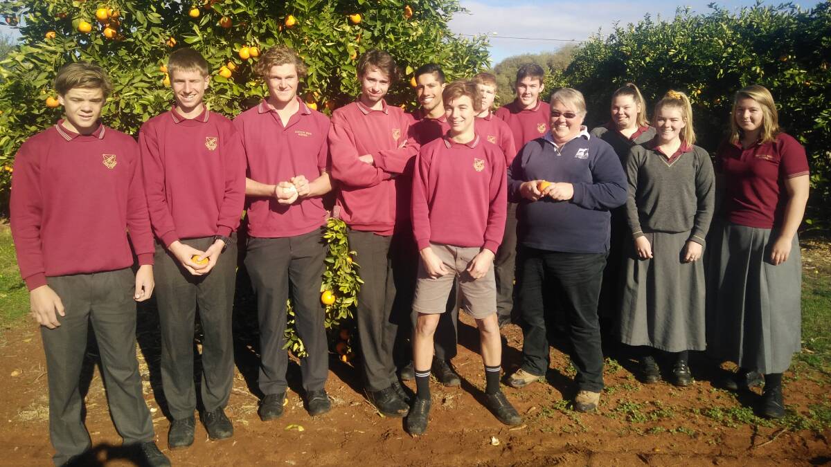 Loxton High School ag teacher Justine Fogden (fourth from right) with students after winning the ATASA award for excellence earlier this year.