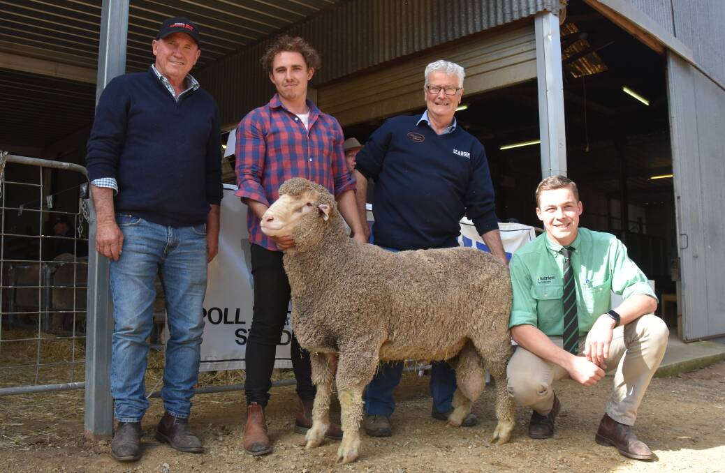 David and Devon Ridgway, Ridgway Advance, Bordertown, bought the $18,000 top price Poll Merino ram from Andrew Michael, Leahcim, Snowtown. Also pictured is Nutrien Bordertown's Jack Guy.