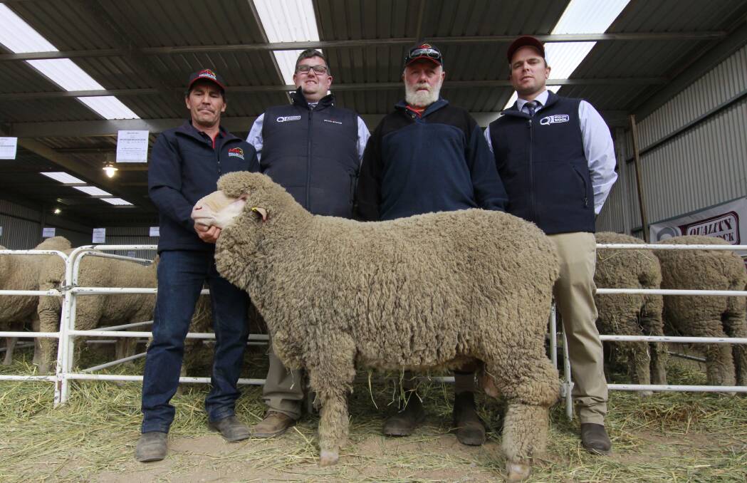 The $5800 top price ram with Mallee Hill principal Warren Beattie; auctioneer David Whittenbury, Quality Livestock; top price ram buyer Les Hull and Damien Johnson, Quality Wool.