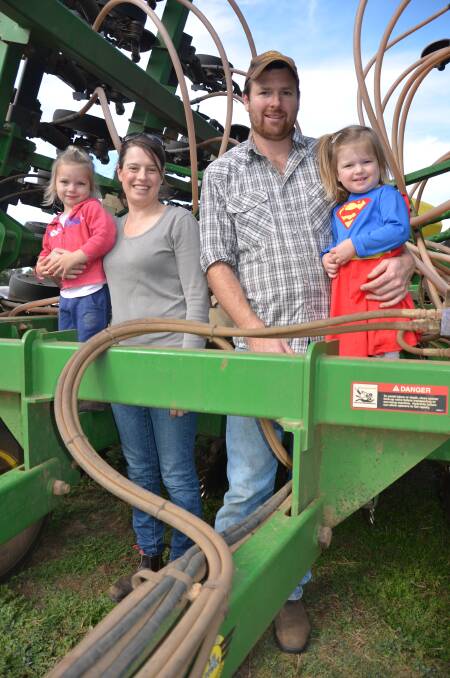 UNDER WAY: Kangaroo Island croppers Jenny and Will Stanton (pictured centre with niece Addison Stanton, 2, and daughter Annabelle, 2), Stokes Bay and Parndana, started seeding on April 23, with early-sown wheat and canola already out of the ground. They had 8mm of rain on Tuesday.