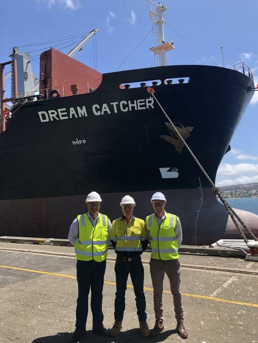 Viterra western region operations manager Nick Pratt, western region operations coordinator Travis Hay and inventory controller Dean Matthews with Viterras first vessel being loaded with new season grain at the Port Lincoln terminal.