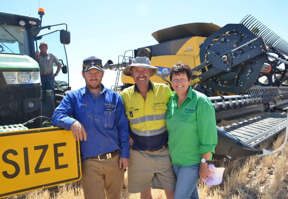 UNDER WAY: Rob, Linden and Julie Price, with workman Tony Winen (back), began harvesting Spartacus barley at Narridy on October 20. The family were happy the crop made malting grade.