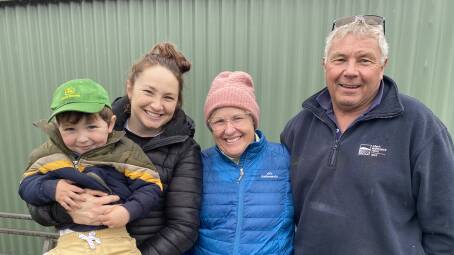 WETHER WATCH: Alby, 2, and Gabrielle Smart, Echunga, were at Mount Pleasant selling Poll Merino wethers, with Janet and Michael Allen, Warrawee Park, Keith, watching on.
