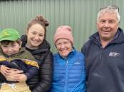 WETHER WATCH: Alby, 2, and Gabrielle Smart, Echunga, were at Mount Pleasant selling Poll Merino wethers, with Janet and Michael Allen, Warrawee Park, Keith, watching on.