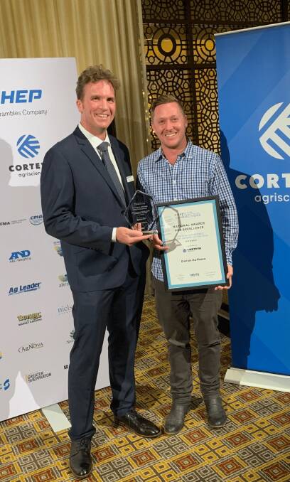 Corteva Agriscience Horticulture & Insecticides marketing manager Nick Koch with 2019 Corteva Agriscience Young Grower of the Year Daniel Hoffman.