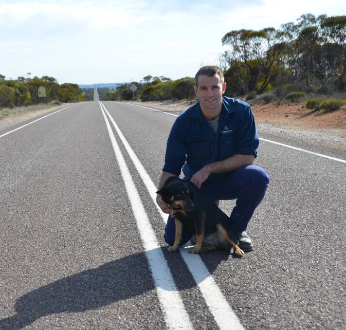 NO LIMITATIONS: Dion Woolford, with dog Yass, lives on the northern end of the Kimba to Cleve Road, where he says the speed limit of 110km/hr should be reinstated as conditions are safe.