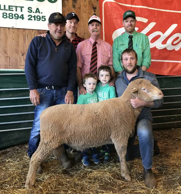 CHARITY SALE: Buyer Nick Schoenberg with Ben Kerslake, Kerslake Foundation, Elders' Tom Penna, Nutrien's Tom Allen and (front) Noah, Brady and Rob Hall from Ulooloo.