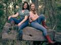 GOOD CAUSE: Kate Strong and Claire Harris are travelling around Australia for 10 months, teaching line dancing to anyone, anywhere and raising money for rural charities. Photo: JACKSON MADDERS