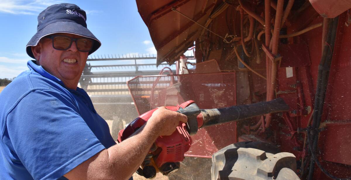 CLEAN UP: Mallee cropper Peter Fogden says they have more machinery maintenance measures in place, after losing a header to an electrical fault at harvest a few years ago.